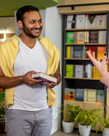 1_group-of-people-talking-in-library
