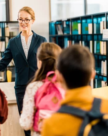 1_librarian-leading-a-group-of-children