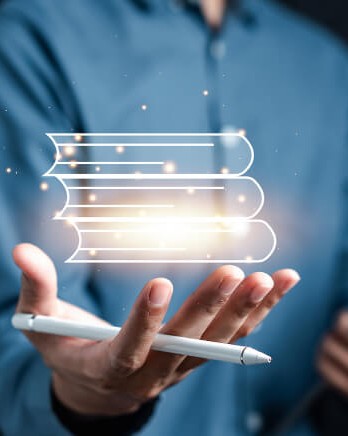 1_man-holding-virtual-book