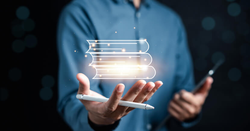 1_man-holding-virtual-book