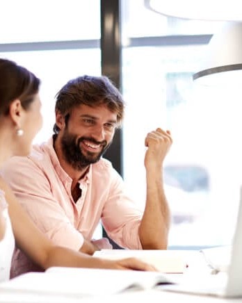1_two-people-studying-at-library-1