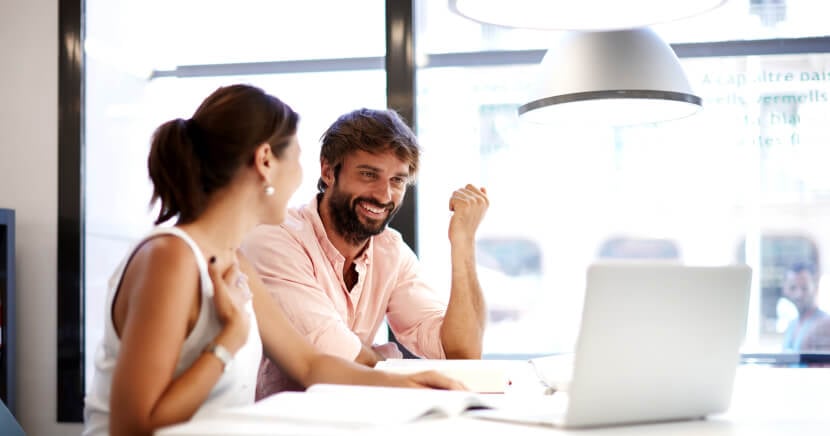 1_two-people-studying-at-library-1