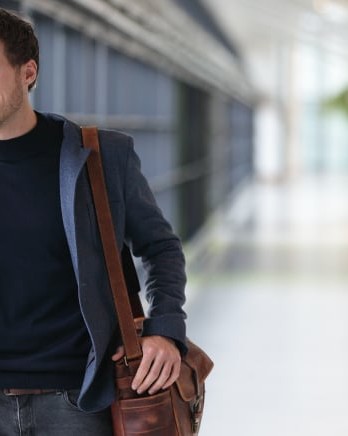 Casual-Business-Traveller-on-Call-at-Airport