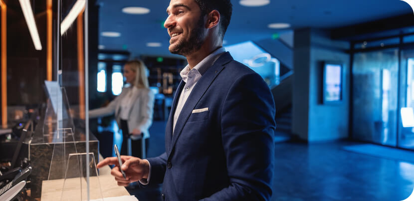 happy-businessman-at-reception