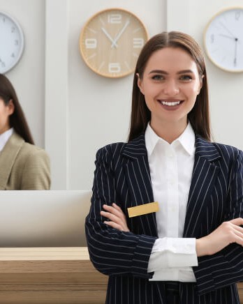 hotel-concierge-smiling-front-desk
