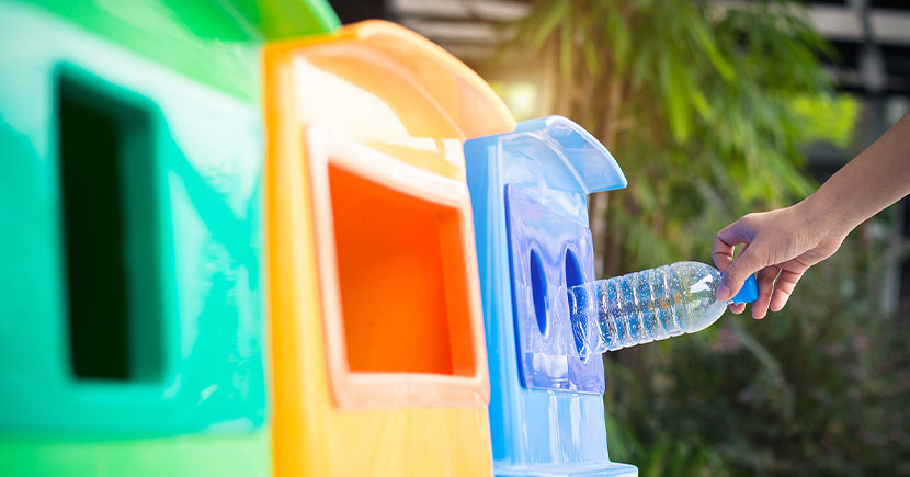 recycling system consisting of 3 garbage cans categorized by color