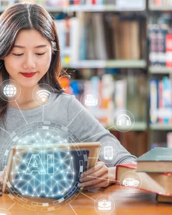 student-in-library-using-tablet