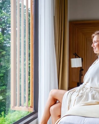 woman-relaxing-in-hotel-room